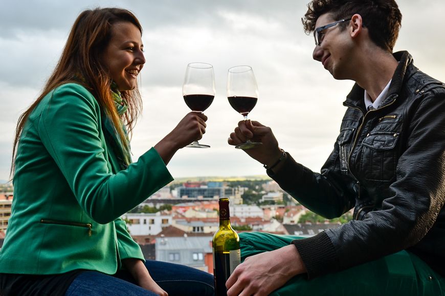 Sit on the walls under the Cathedral of St Peter and St Paul with a bottle of wine. 